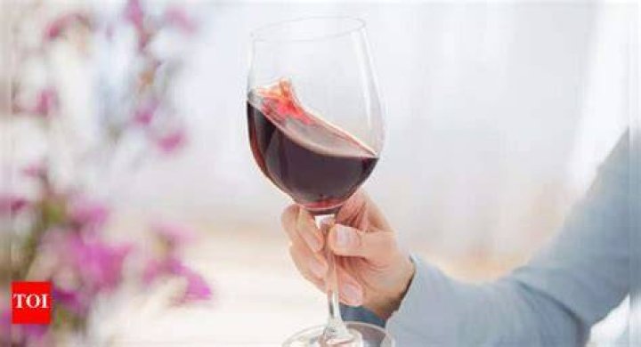 Why do people shake their wine before drinking?